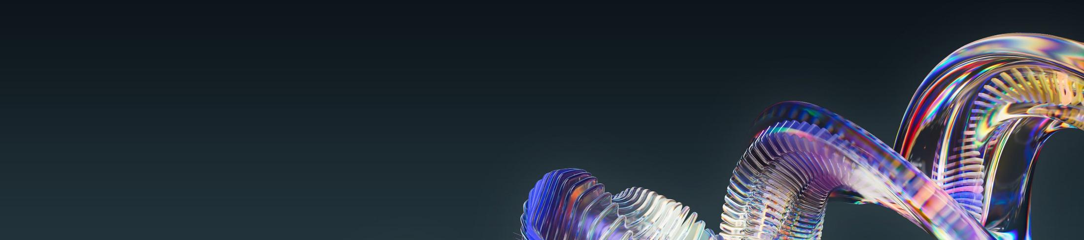 a close up of a colorful object in motion against a black background